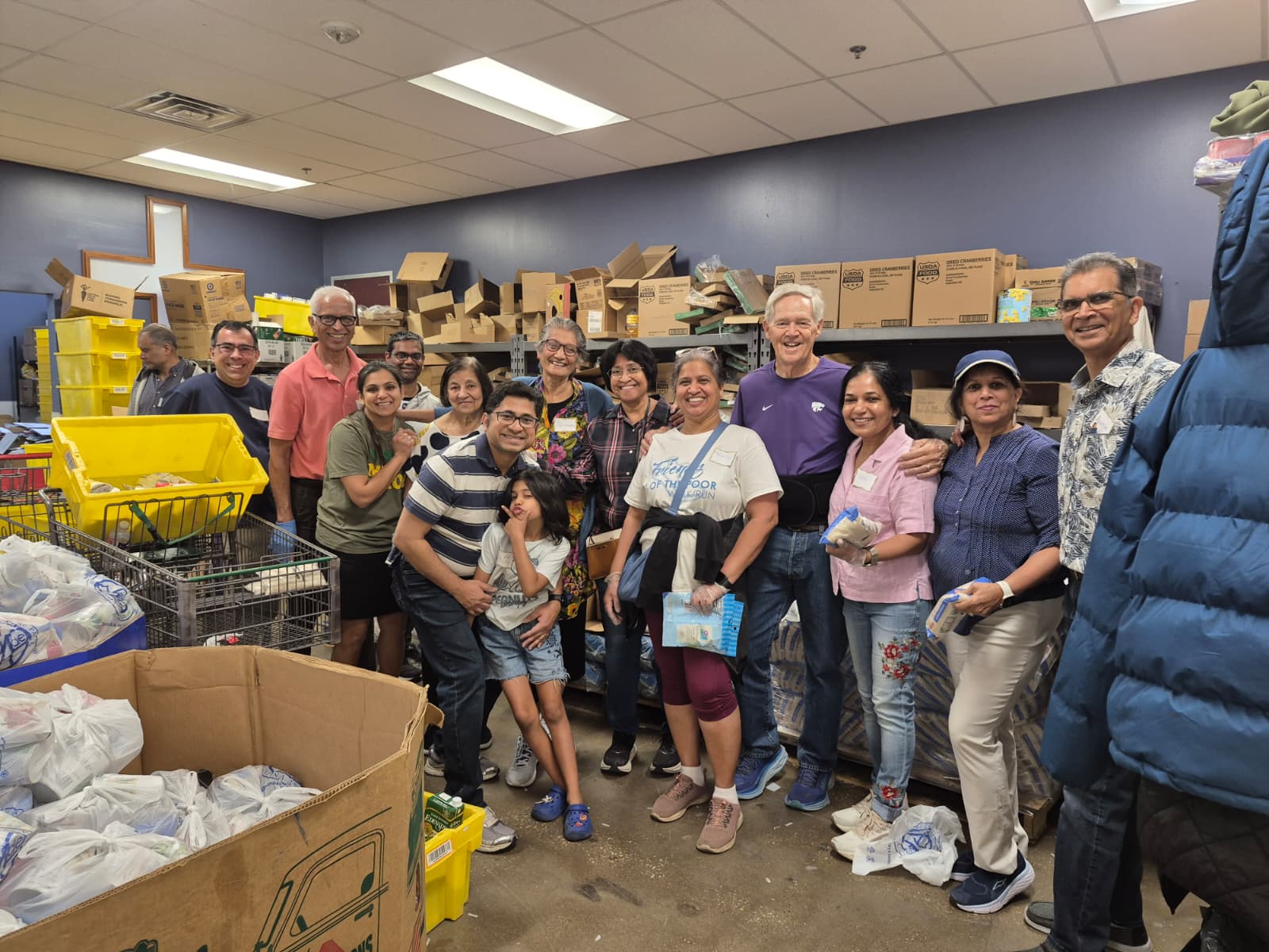 ICA volunteers serving together at the St. Vincent de Paul food pantry in 2026